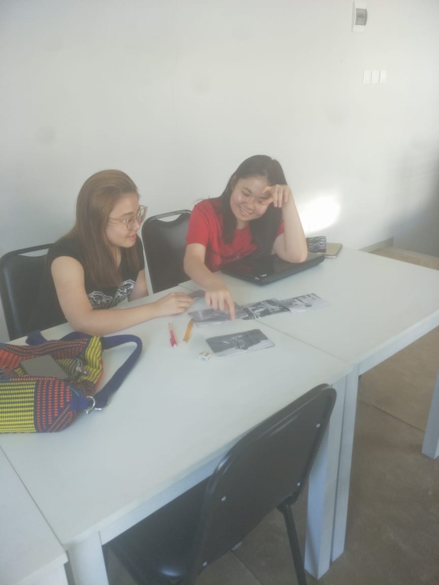 TELC students collaborating during an English learning activity